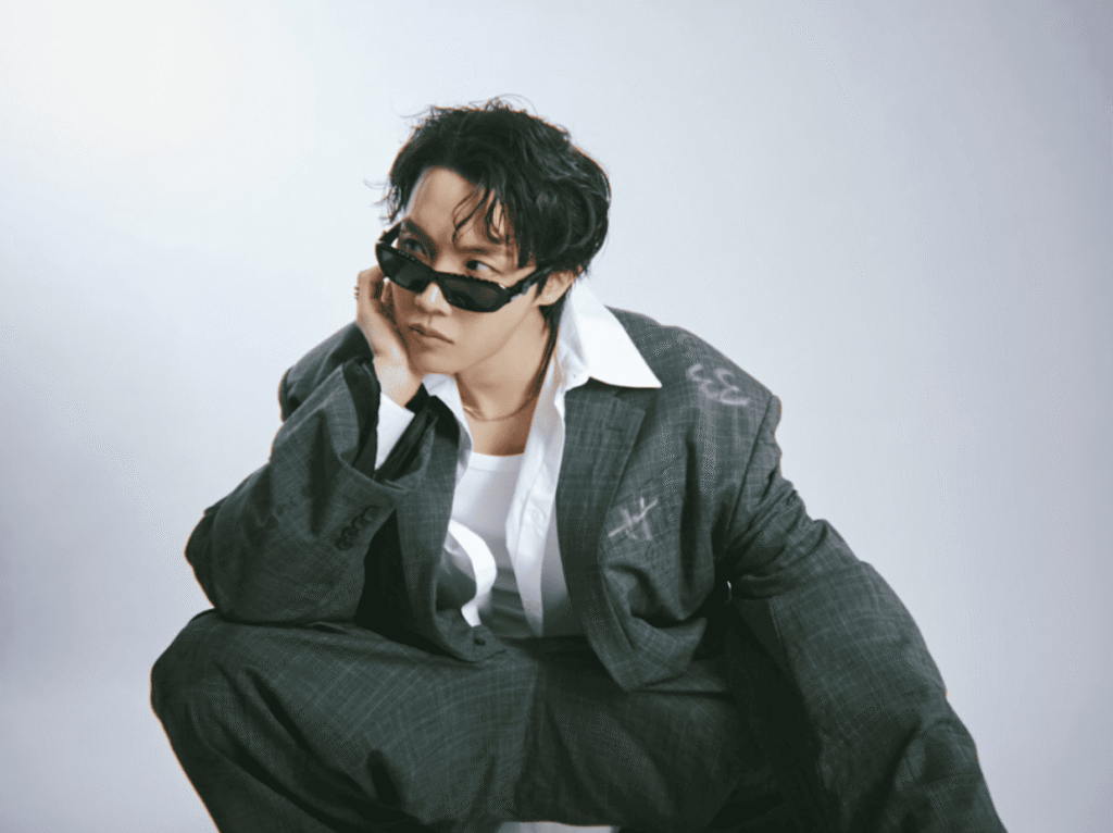 Solo image of J-Hope posing in stylish stagewear Solo image of J-Hope posing in stylish stagewear